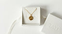 The Contoured Coin Pendant Necklace