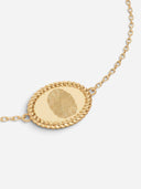 TAYLR gold oval rope bracelet featuring a custom engraved fingerprint on a delicate chain for a personalized keepsake.