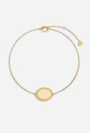 TAYLR gold oval rope bracelet with a central blank pendant for custom handprint engraving on a delicate chain.