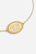 TAYLR gold oval rope bracelet with custom engraved initials and date on a delicate chain