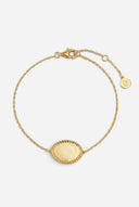 TAYLR gold oval rope bracelet featuring a central pendant for custom fingerprint engraving on a delicate chain.