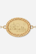 TAYLR gold oval bracelet featuring a rope-style border and a custom engraved child's family drawing keepsake