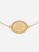TAYLR gold oval rope bracelet featuring custom handwritten engraving on a delicate chain