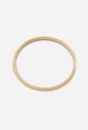 TAYLR 18k gold vermeil ribbed bangle featuring delicate lab-grown diamonds in a circular design