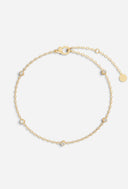 TAYLR gold station bracelet featuring five bezel-set lab-grown diamonds on a delicate cable chain with lobster clasp.